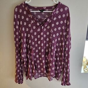 Purple long sleeve shirt.